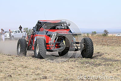 Forty Five degree close-up view of Speeding red Hellcat rally ca Editorial Stock Photo